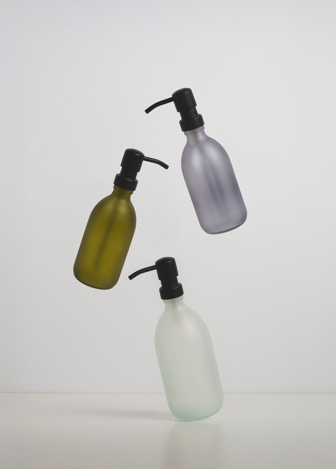 Different colour glass bottle soap dispensers
