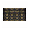 Black placemat with gold wave pattern on a white background