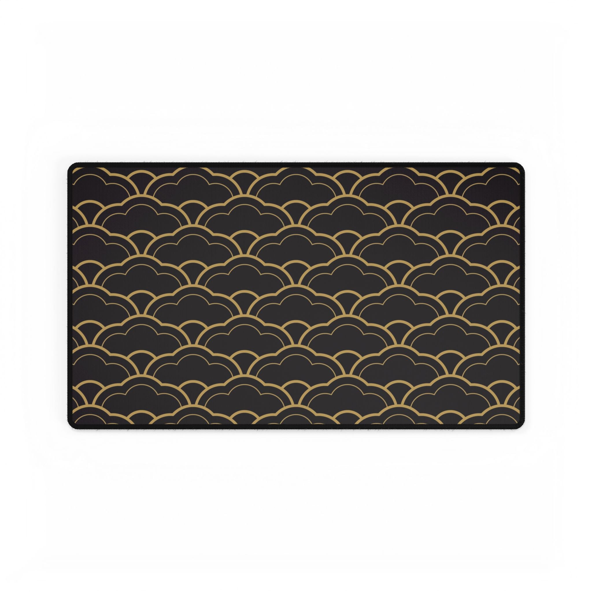 Black placemat with gold wave pattern on a white background