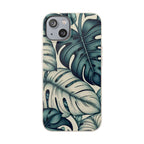 A full, straight-on view of an iPhone in a beige, speckled case with a teal and blue monstera leaf pattern. The case covers the entire back of the phone, and the dual camera lens cutout is visible in the top left corner.