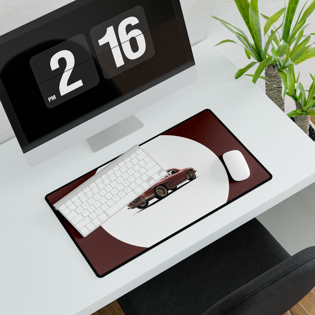 Desk setup with a desk mat featuring a car design, keyboard, mouse, and digital clock.