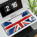 Desk setup with a Union Jack design mouse pad, keyboard, and computer monitor.