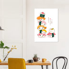 Wall poster featuring cute illustrated sushi characters stacked playfully, with the text “Happy Sushi Time,” displayed in a minimalist interior above a wooden table with plants and mugs.