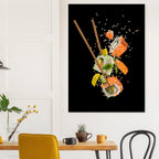 Wall poster showing sushi pieces suspended mid-air with chopsticks, sesame seeds and ingredients scattering against a black background, displayed in a minimalist bedroom interior.