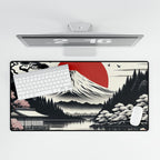 Desk setup with a large desk mat featuring a mountain design, keyboard, and mouse.