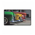Four colorful classic cars lined up on a white background mouse pad