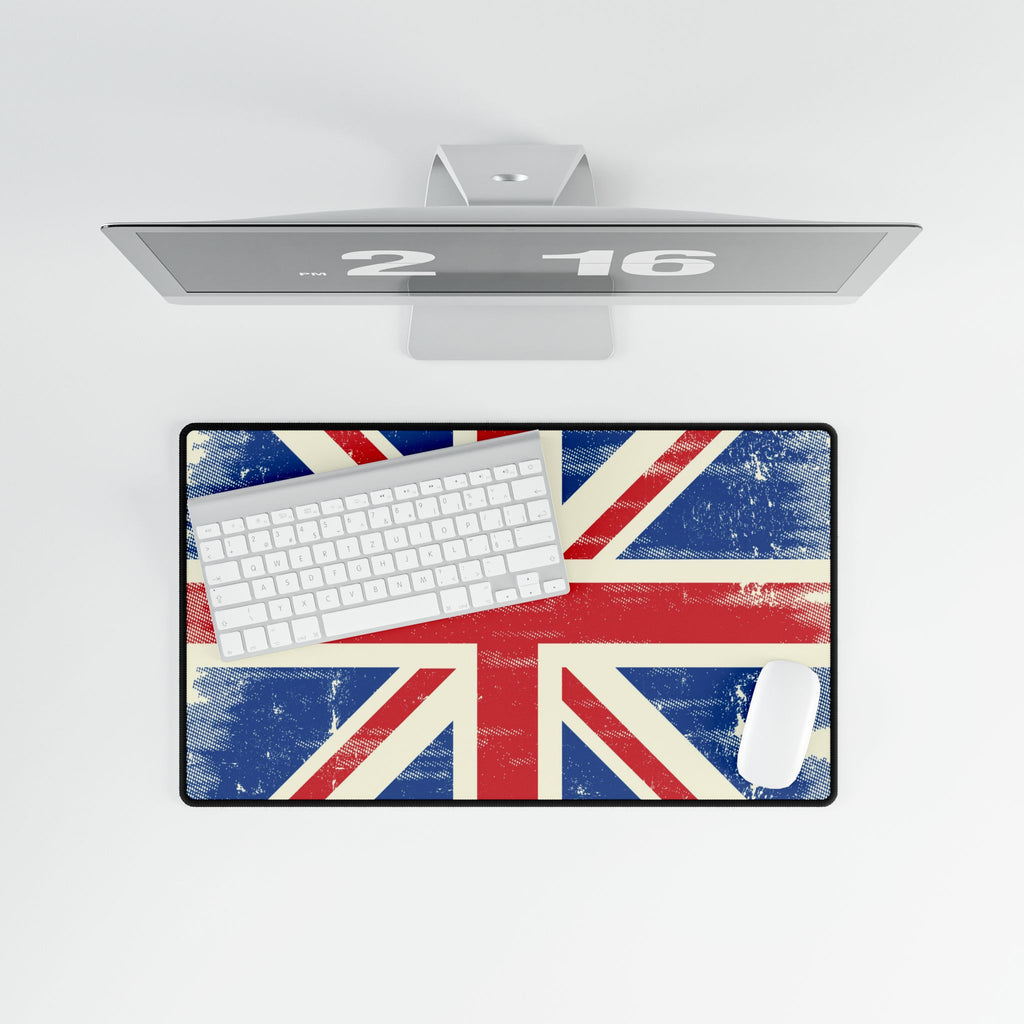 Desk setup with a Union Jack design mouse pad, keyboard, and mouse on a white background.