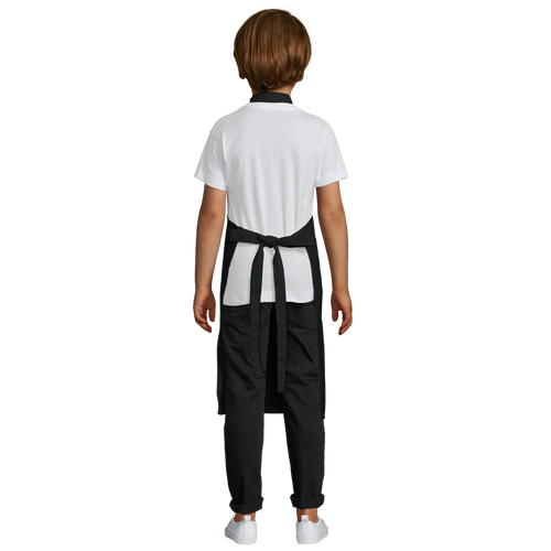 Person wearing a white shirt and black apron on a white background
