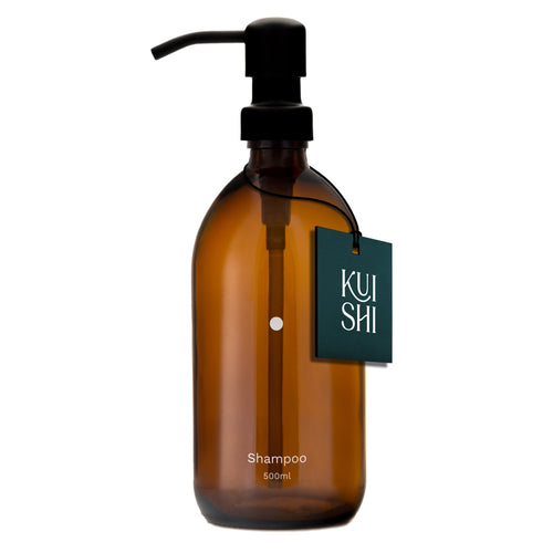 Brown shampoo bottle with pump and 'KUSHI' label on a white background
