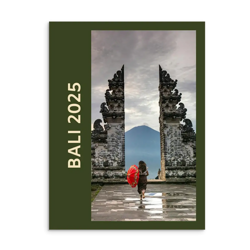 Bali Travel Photo Book with stone gate and person holding a red umbrella, featuring 'Bali 2025' text.