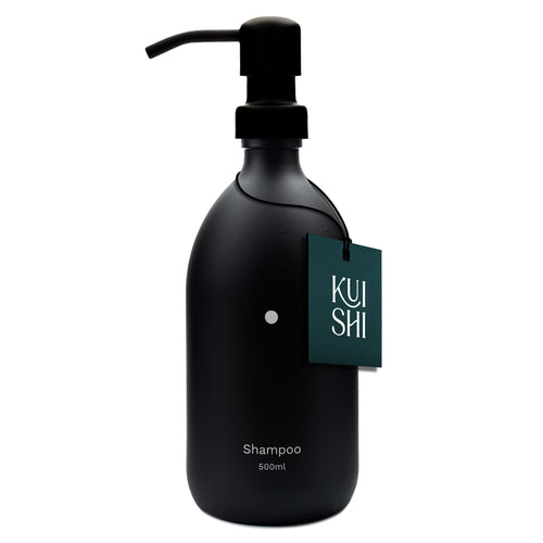 Black shampoo bottle with pump and 'Kushi' label on a white background