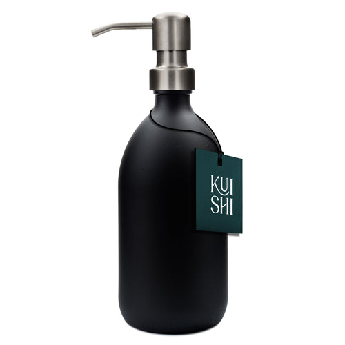 Black soap dispenser with silver pump and 'KUSH' tag on a white background
