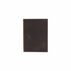 Dark brown leather-bound book on a white background from MVB STUDIO official store.