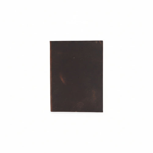 Dark brown leather-bound book on a white background from MVB STUDIO official store.