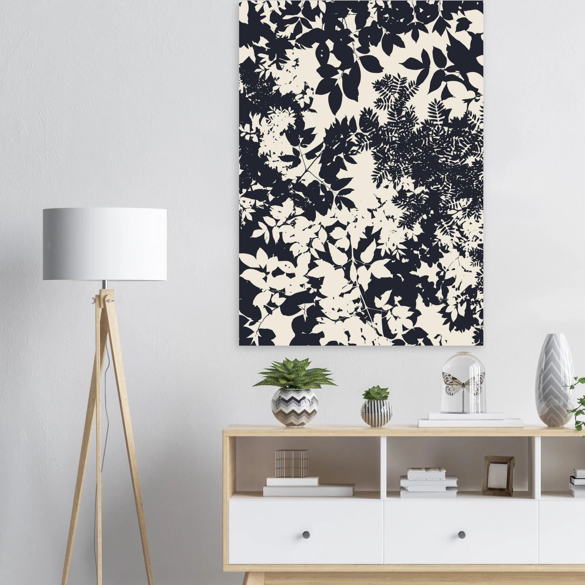 Floral patterned wall art above a wooden console table with decorative items.