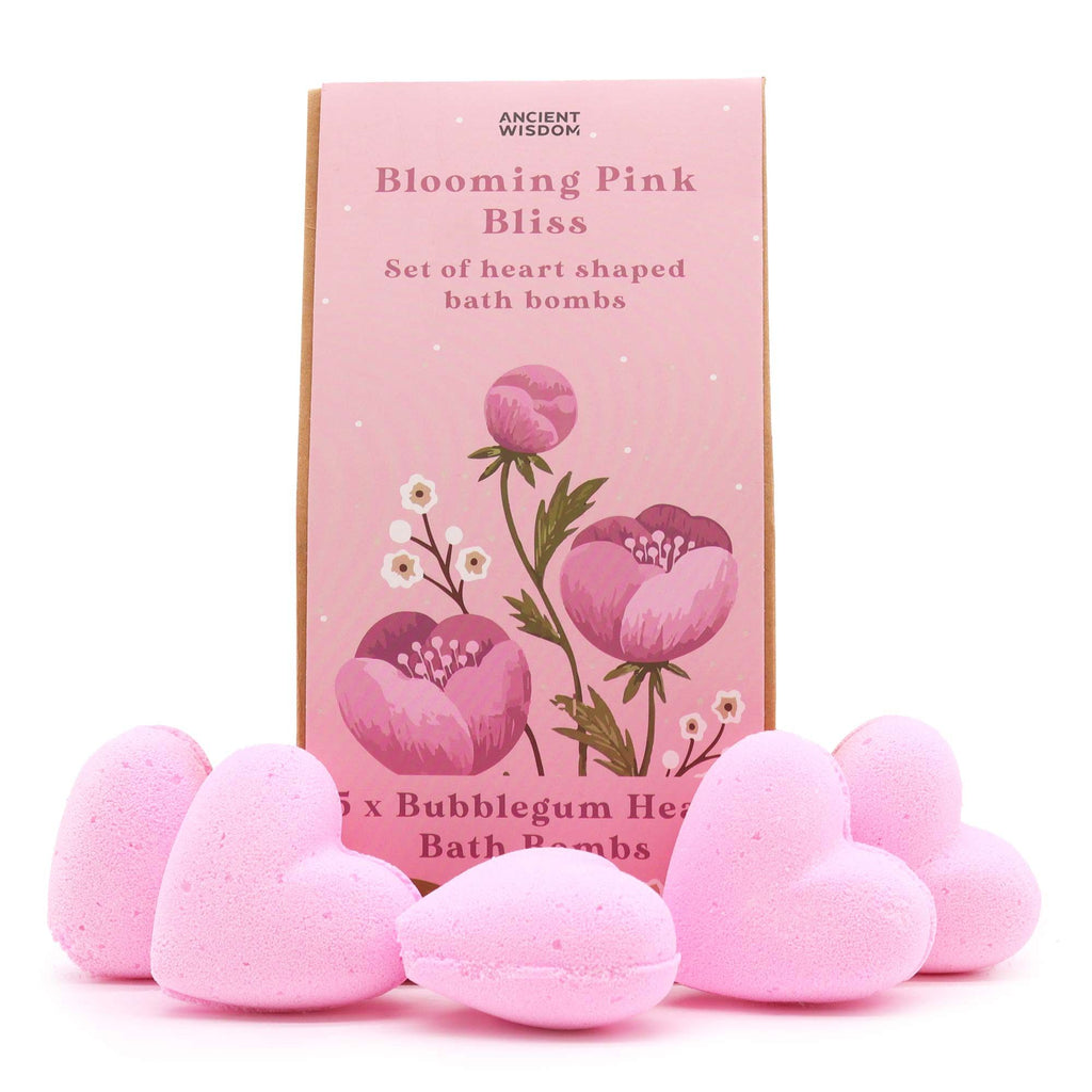 Pink heart-shaped bath bombs with a 'Blooming Pink Bliss' packaging on a white background