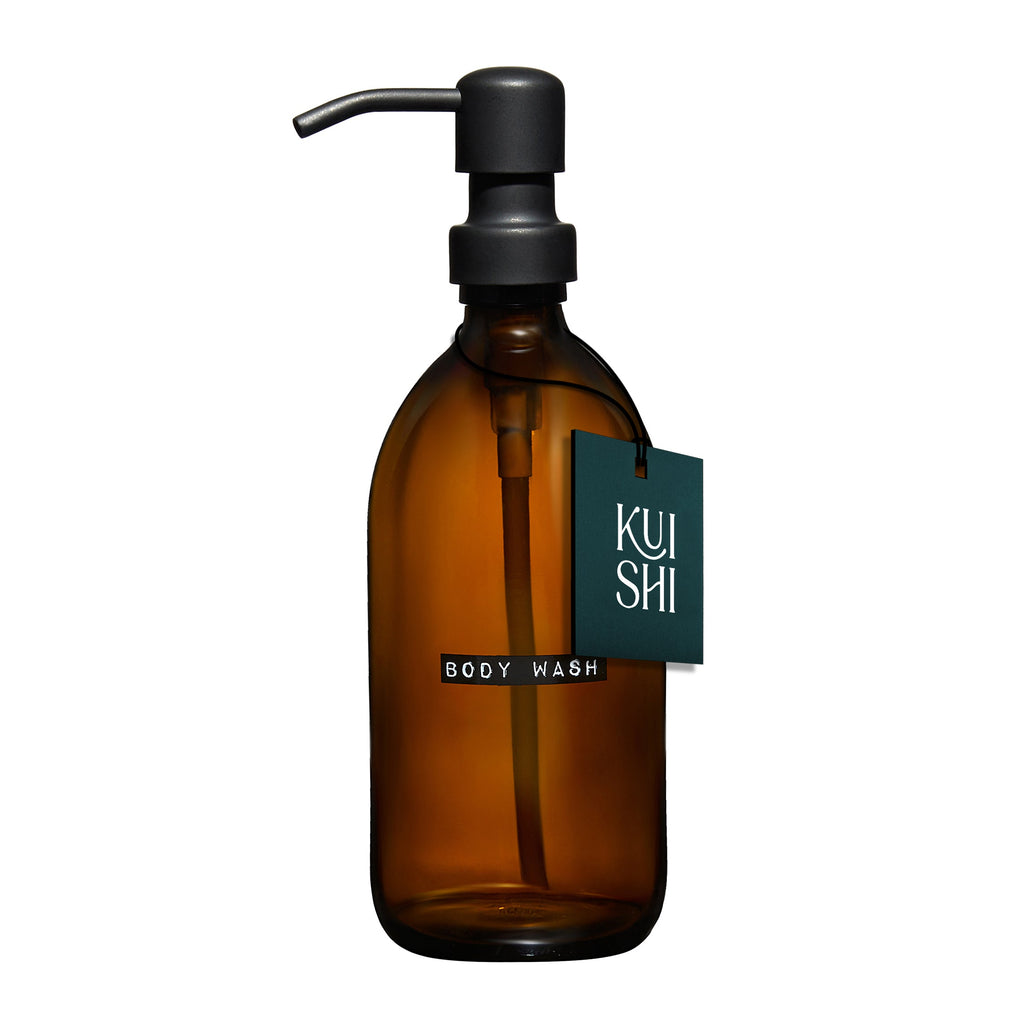 Brown bottle with pump and 'KUI SHI' label on a white background