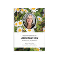 A personalized memorial card with a floral daisy background and an oval photo of a woman, above the text 'In Loving Memory of Jane Davies' and memorial details.