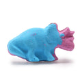 Blue and pink dinosaur-shaped bath bomb on a white background