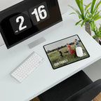 Modern office desk with computer, mouse pad displaying 'Our Family' photo, and digital clock.