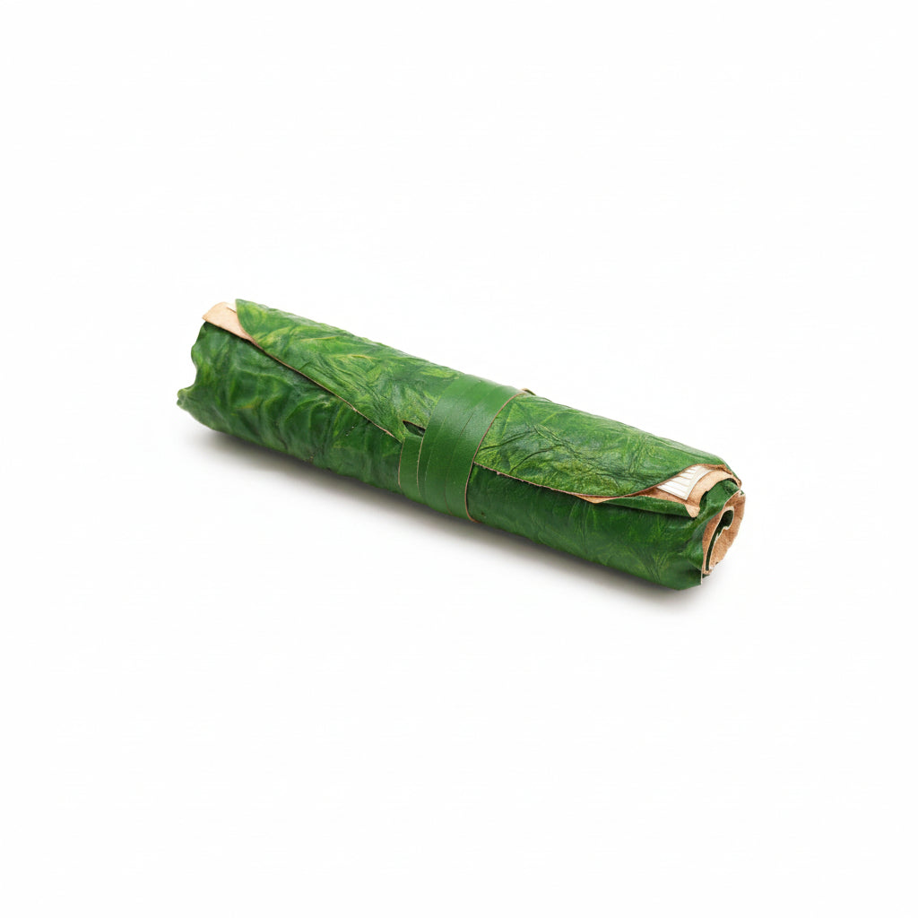 Roll of green Green Rolled Leather Travel Notebook – 96 Pages – A5 (21 × 15 cm) on a white background