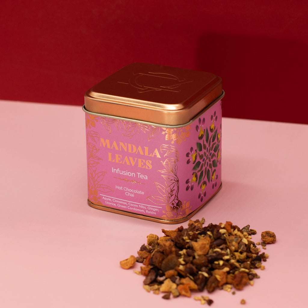 Hot Chocolate Chai Infusion - 50g, Mandala Leaves tea tin with loose tea leaves on a pink background