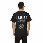 Person wearing a black t-shirt with 'IKIGAI' printed on the back against a white background