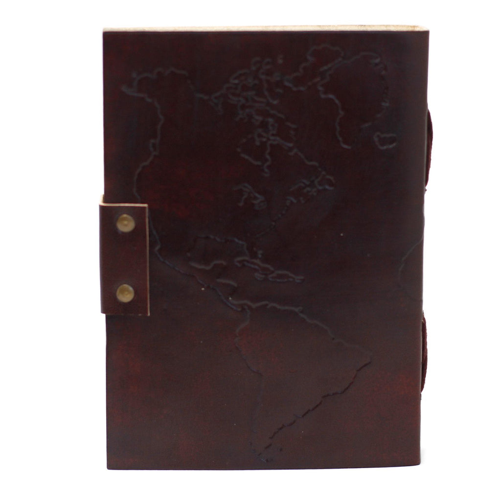 Brown leather notebook with embossed design on a white background