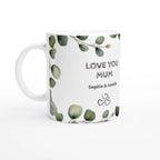 Mug with green leaf pattern and 'Love You Mum' text on a white background