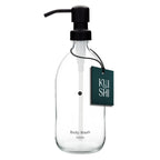 Clear glass bottle with black pump and 'Kushi' label on a white background