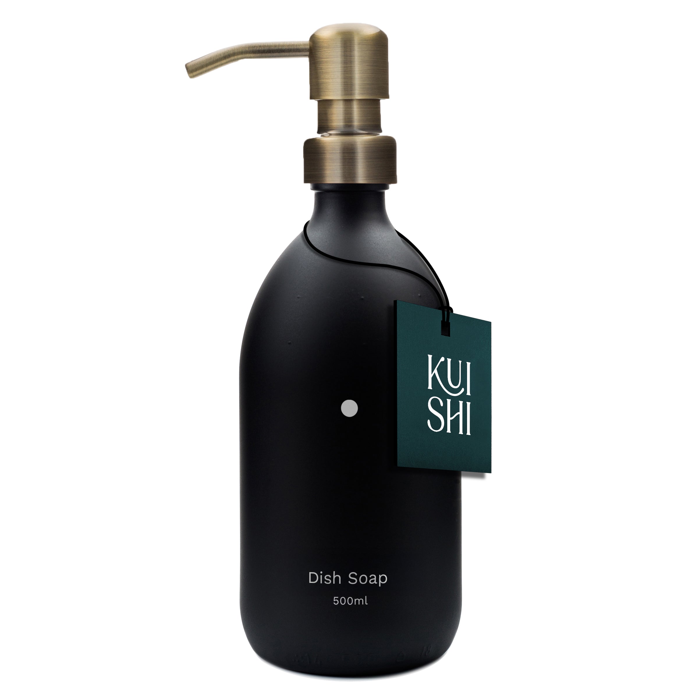 Black dish soap bottle with brass pump and 'Kushi' label on a white background