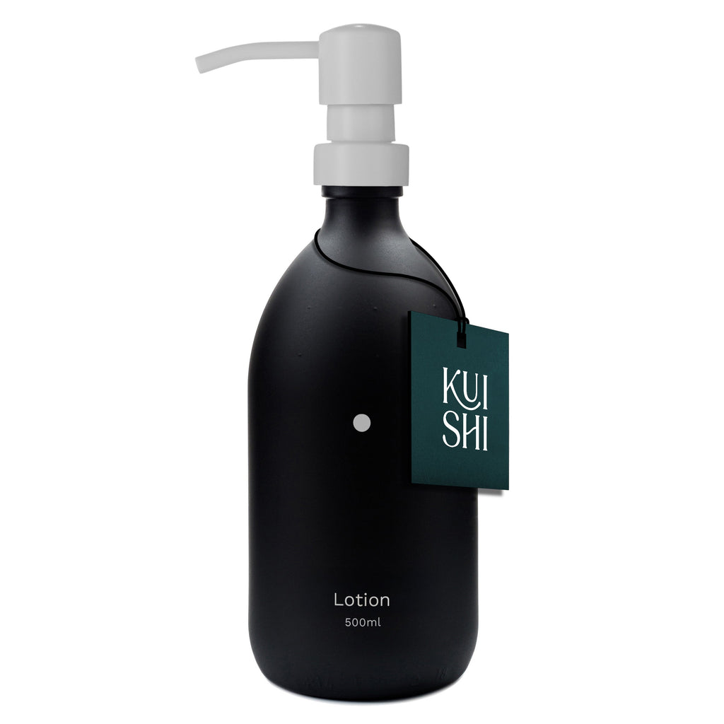 Black lotion bottle with pump and 'Kushi' label on a white background
