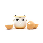 Cute ceramic panda-shaped teapot with two panda-shaped tea cups on a white background