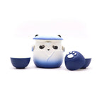Ceramic teapot with panda design on a white background