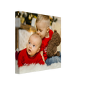 Personalised Canvas 20x20 cm / 8x8″ Two children in red shirts with a teddy bear on a white background