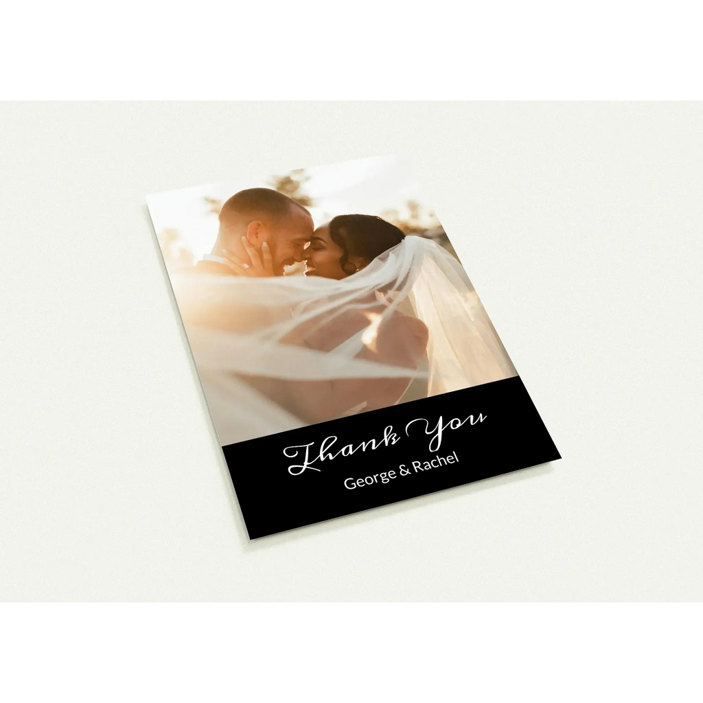 Greeting card with a couple kissing and 'Thank You George & Rachel' text on a white background