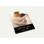 Greeting card with a couple kissing and 'Thank You George & Rachel' text on a white background