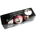 Box of 'Martini Special Agent' bath bombs with decorative design on a white background