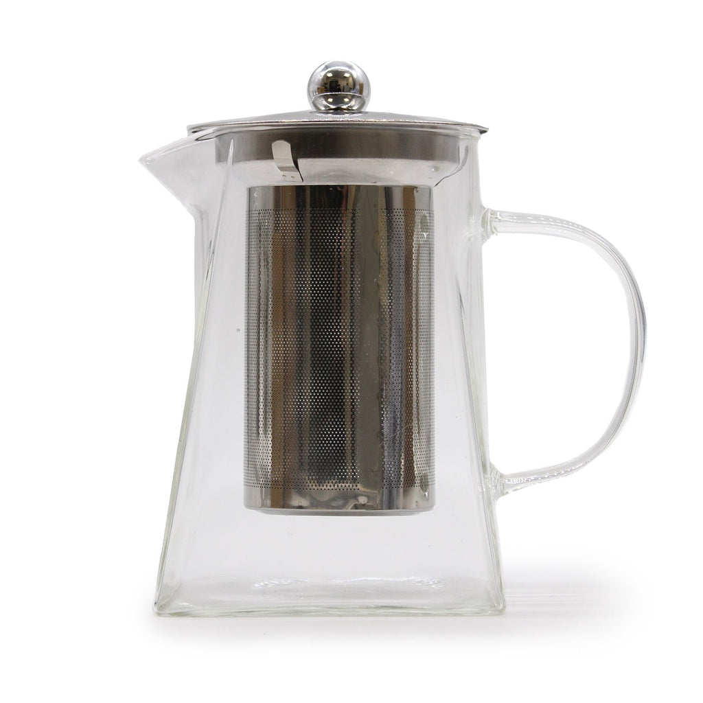 Clear glass teapot with metal infuser on a white background
