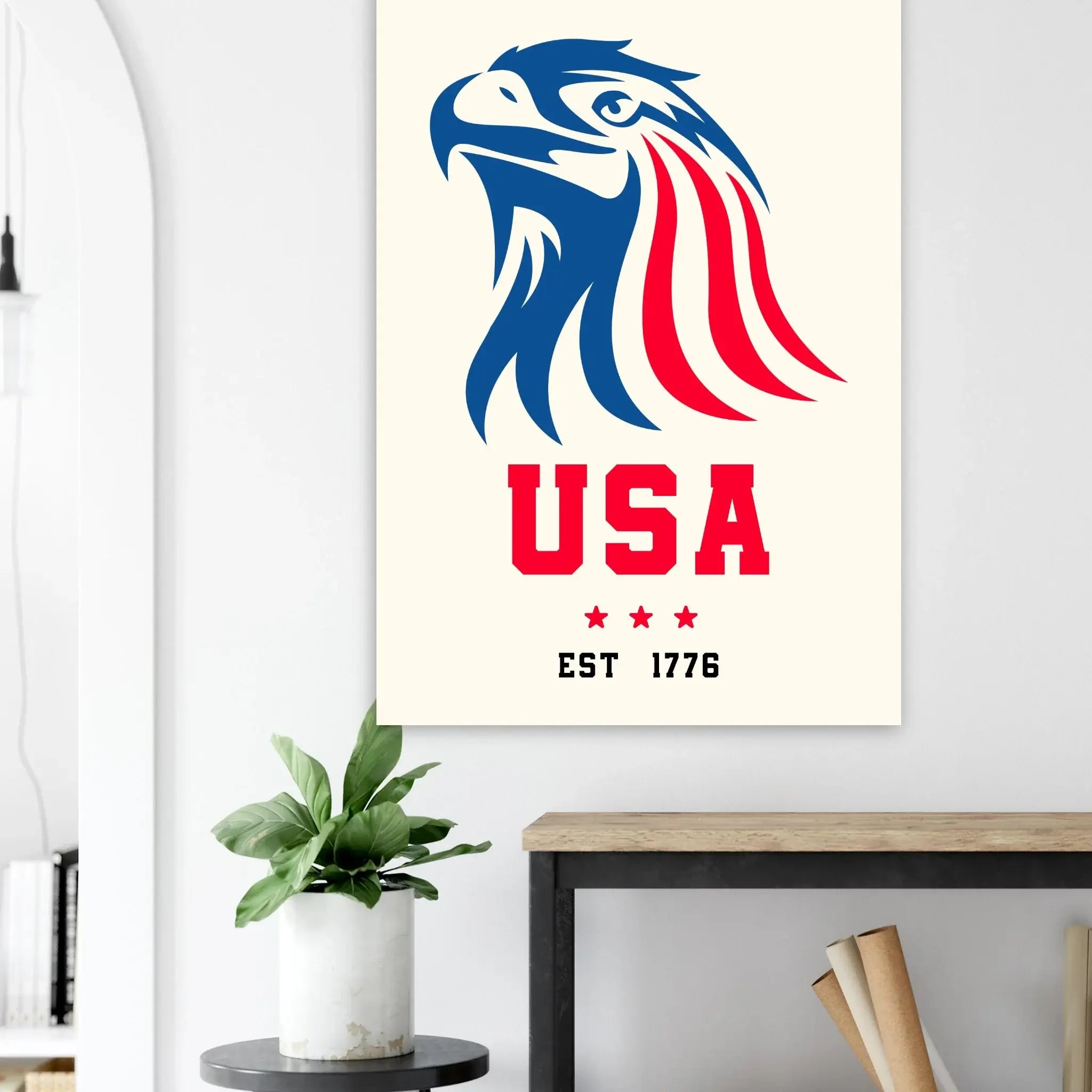 USA-themed wall art with an eagle design on a white wall above a desk.