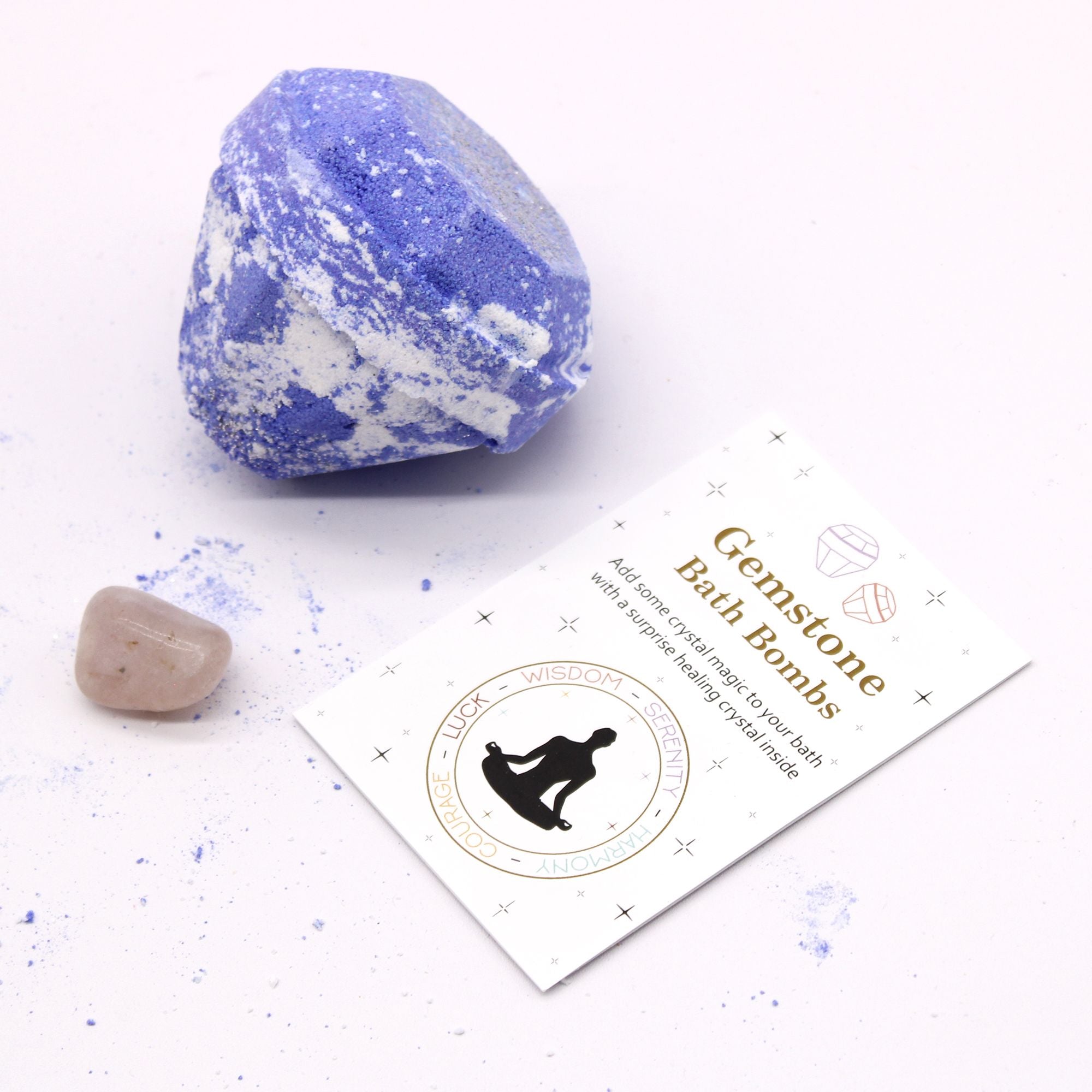 Blue and white gemstone bath bomb with a card labeled 'Gemstone Bath Bombs' on a white background
