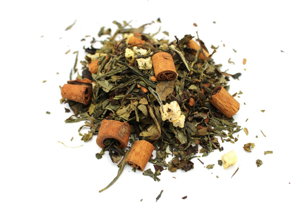 White Tea with Sencha, Apple & Cinnamon - 50g assorted loose leaf tea on a white background