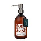 Brown bottle of body wash with pump and 'KUSHI' label on a white background