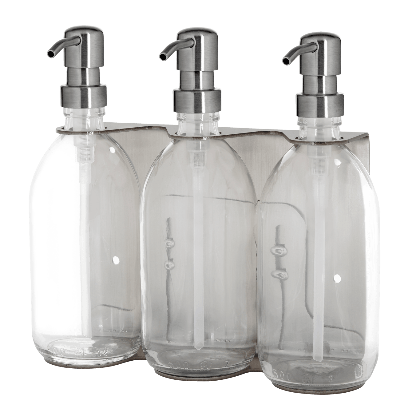 Three clear glass bottles with silver pumps in a packaging tray on a dark background