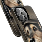 Phone case with a dog's face design on a white background close up