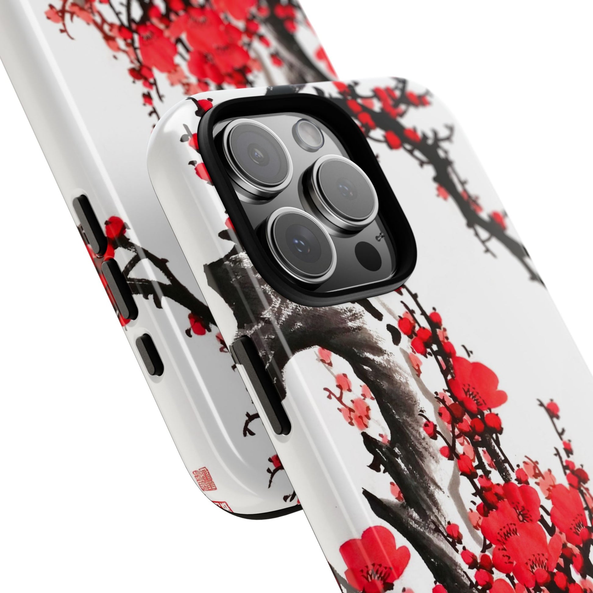 Phone case with cherry blossom design on a white background and close up
