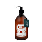 Brown conditioner bottle with pump and 'Kushi' label on a white background