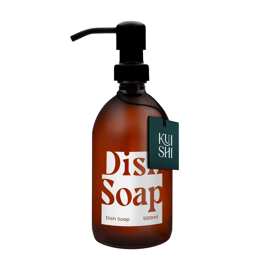 Brown bottle of dish soap with pump and 'Kushi' label on a white background