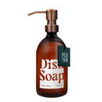 Brown dish soap bottle with pump and 'Kushi' label on a white background