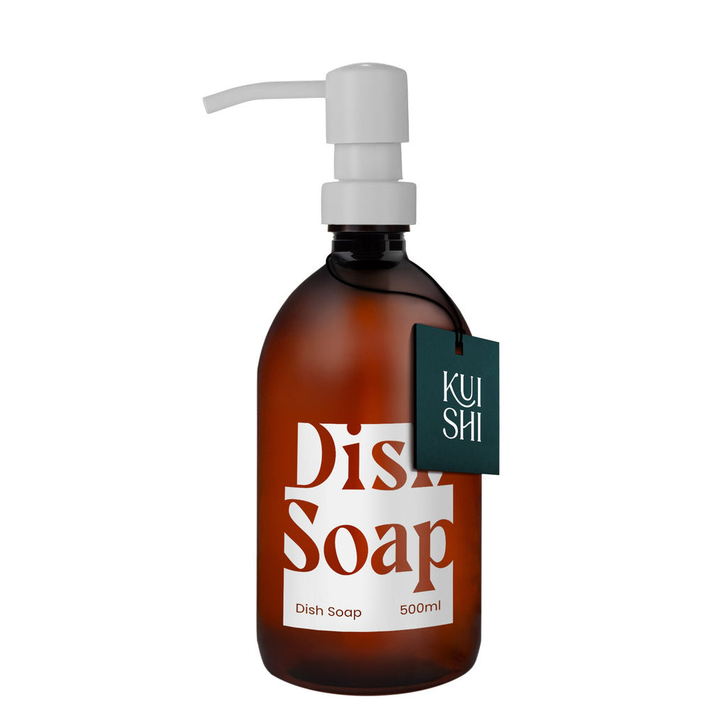 Brown bottle of dish soap with pump and 'Kushi' label on a white background